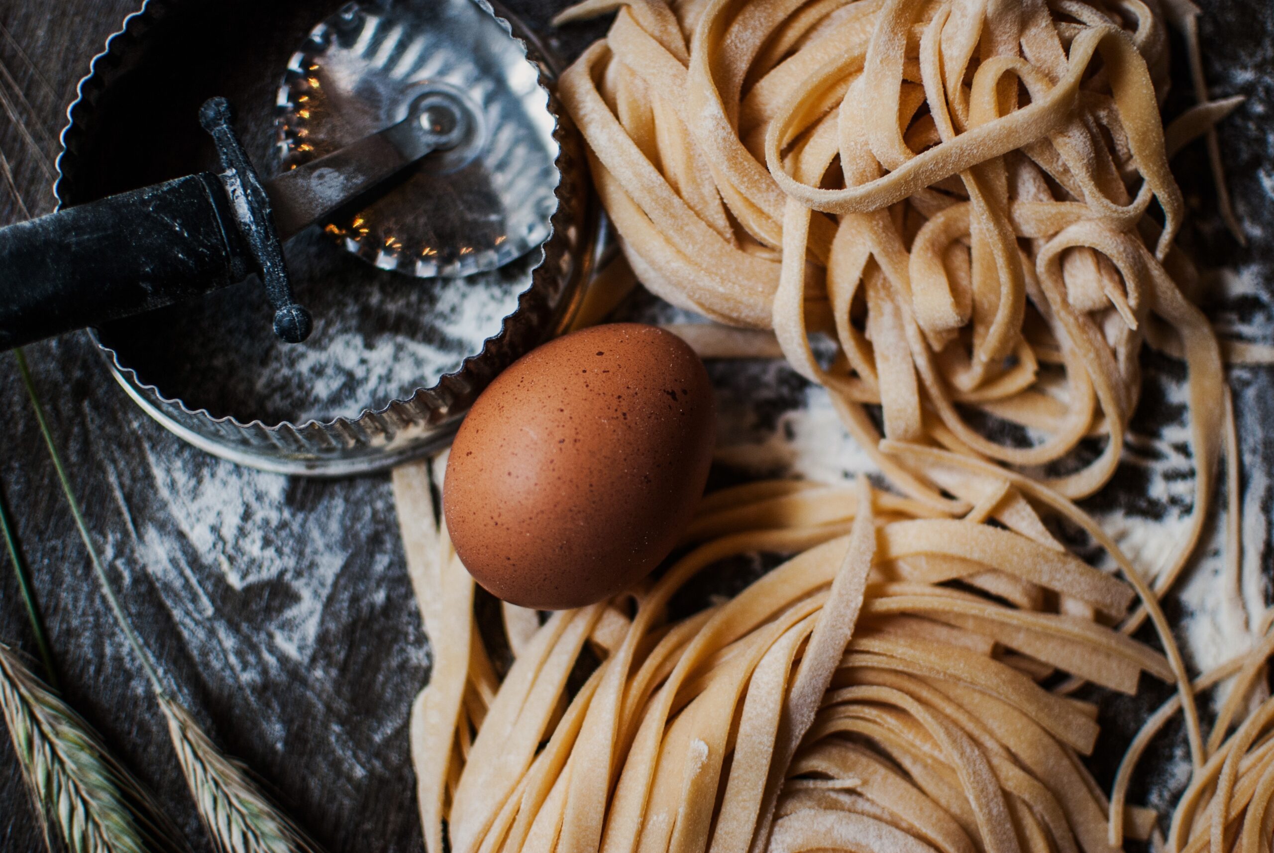 A high angle closeup shot the ingredients for pasta preparation